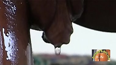 Ebony Teen Amateur Drenches Her Naked Body with Baby Oil and Fucks Her Oiled Asshole with a Dildo