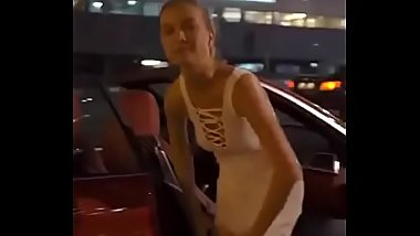 Petite Blonde nude on street