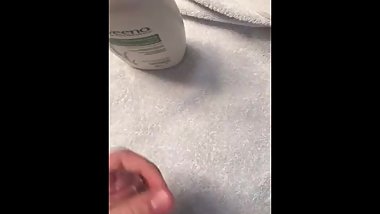 Putting cream on my big hard cock