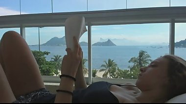 Beautiful Girl Fills Her Mouth In Paradise After Reading