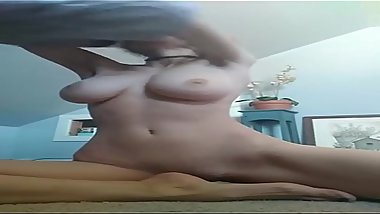 Girl with big jiggly boobs taking her shirt off