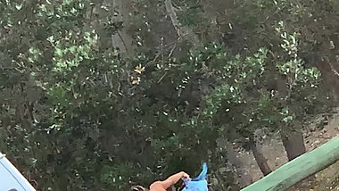 Changing behind car naked