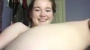 blonde inserting three fingers in the ass