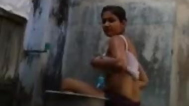 India girl bathing